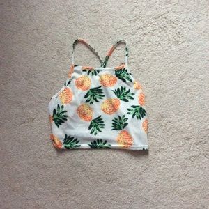 A cropped pineapple cover up